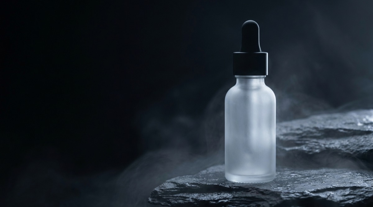 Source photo: serum bottle packshot, wide 16:9 framing