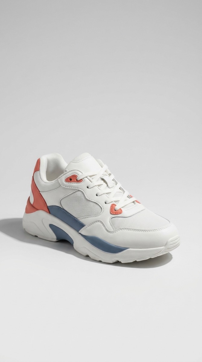 Source photo: sneaker product shot, vertical 9:16 framing